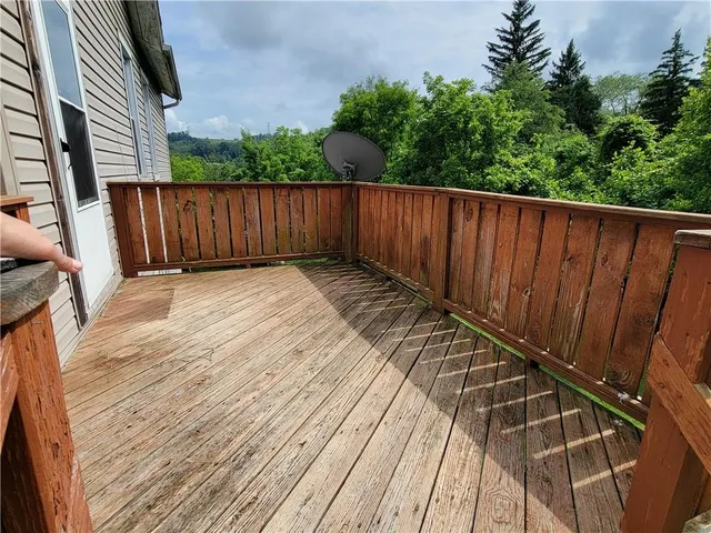a view of outdoor space with wooden deck