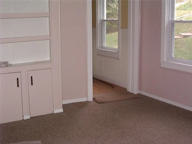 an empty room with windows