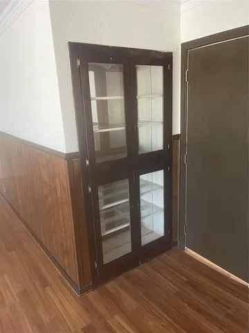 front view of house with a trees