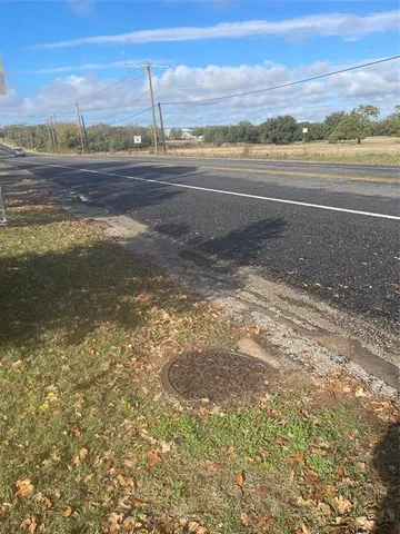 a view of balcony with furniture