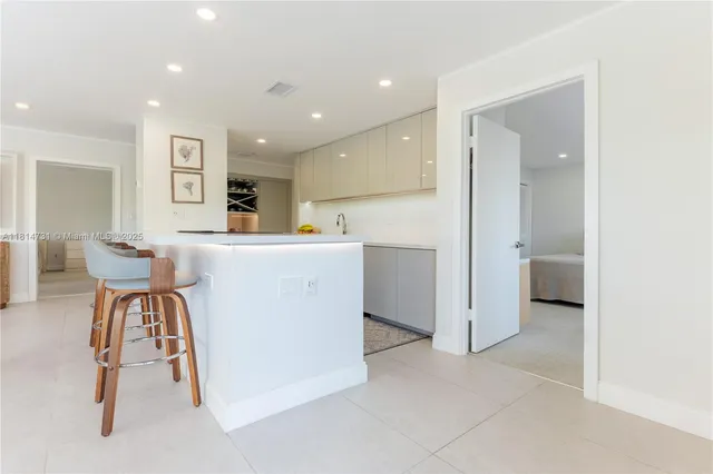 a view of a kitchen and dining room