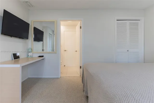 a view of a livingroom with a flat screen tv