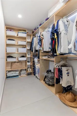 a view of a patio with table and chairs with potted plants