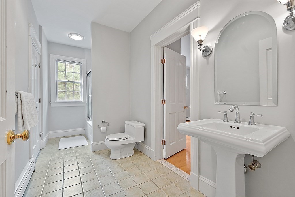 451 Wellesley Street Weston, MA 02493 - Photo 31 of 41 a bathroom with a sink toilet and shower