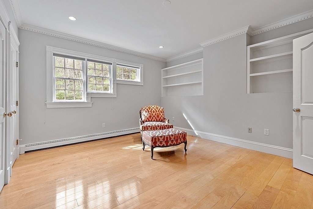 451 Wellesley Street Weston, MA 02493 - Photo 32 of 41 a living room with furniture and a window