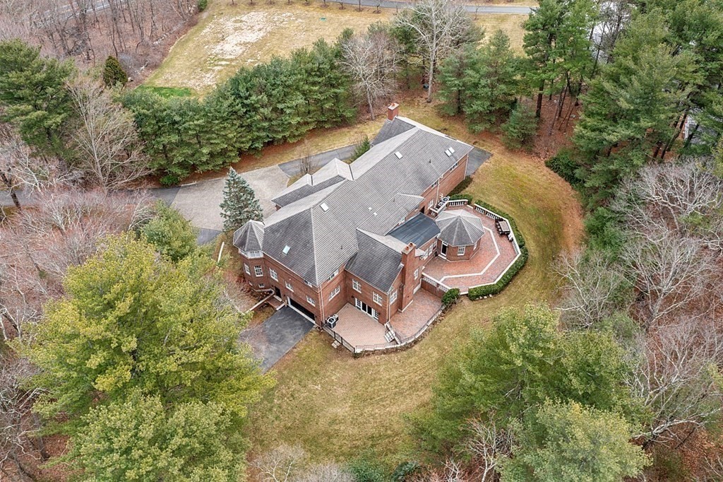 451 Wellesley Street Weston, MA 02493 - Photo 38 of 41 an aerial view of a house with a yard and large trees