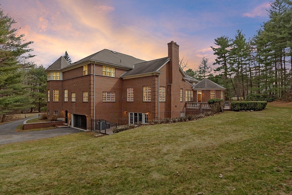 451 Wellesley Street Weston, MA 02493 - Photo 40 of 41 a front view of a house with a yard