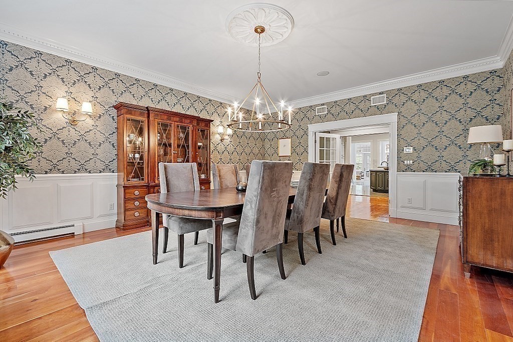 451 Wellesley Street Weston, MA 02493 - Photo 8 of 41 a view of a dining room with furniture and wooden floor