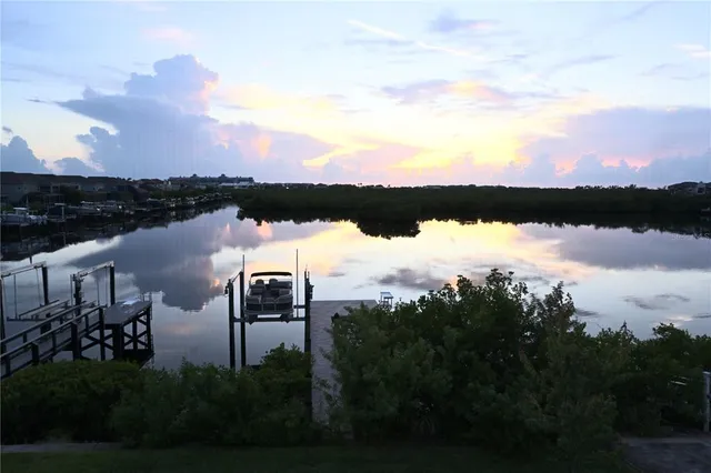 a view of a lake from a yard