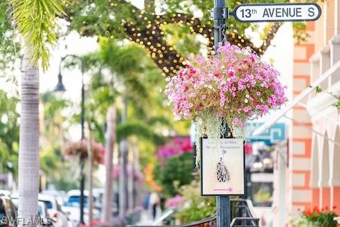 a street sign is next to a building