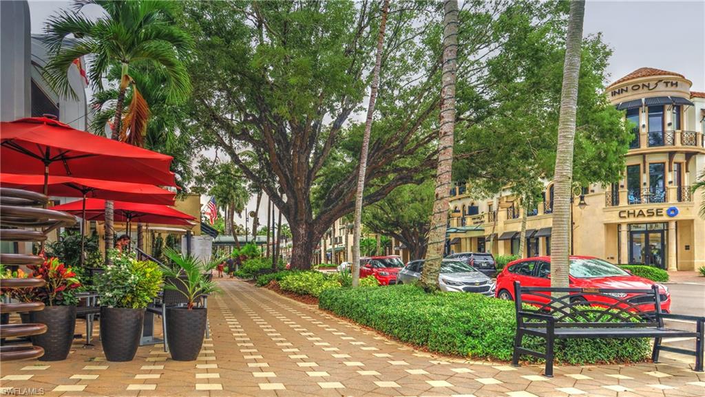 239 Torrey Pines Point Naples, FL 34113 - Photo 38 of 46 a view of street with sitting area