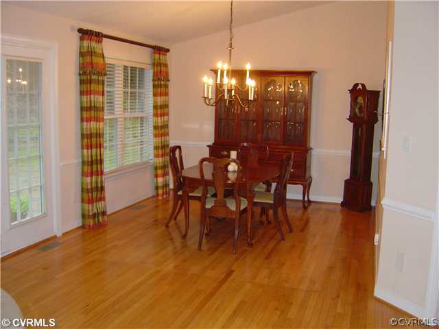 2128 Flint Hill Road Powhatan, VA 23139 - Photo 7 of 12 Dining Room - Hardwood flooring, chair rail moldin