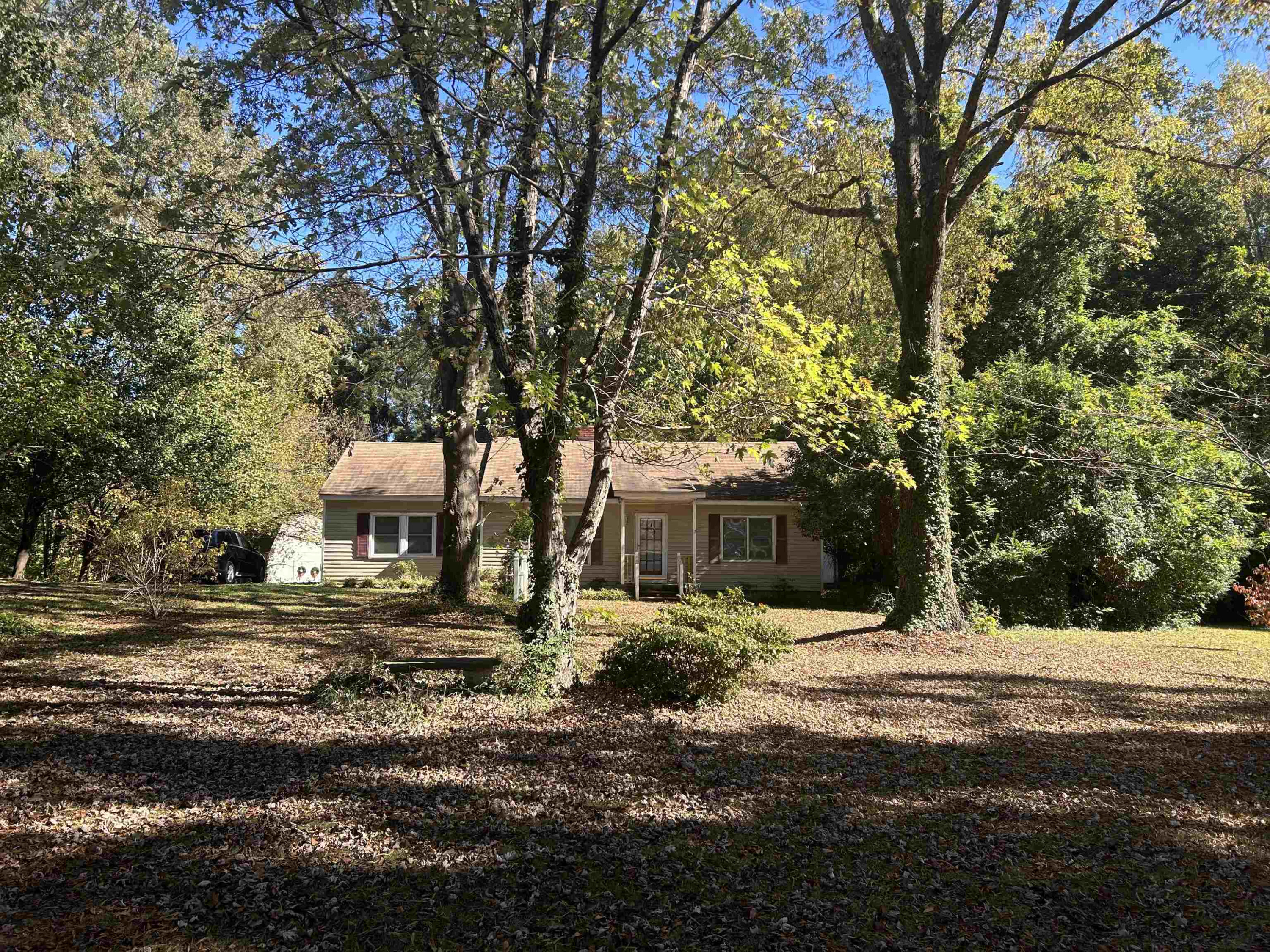 25 Burton Avenue Raleigh, NC 27606 - Photo 2 of 24 a view of a house with a yard