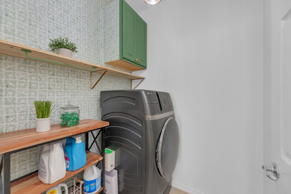 8901 Meridian Oak Lane Austin, TX 78744 - Photo 22 of 26 a view of balcony with furniture and wooden floor