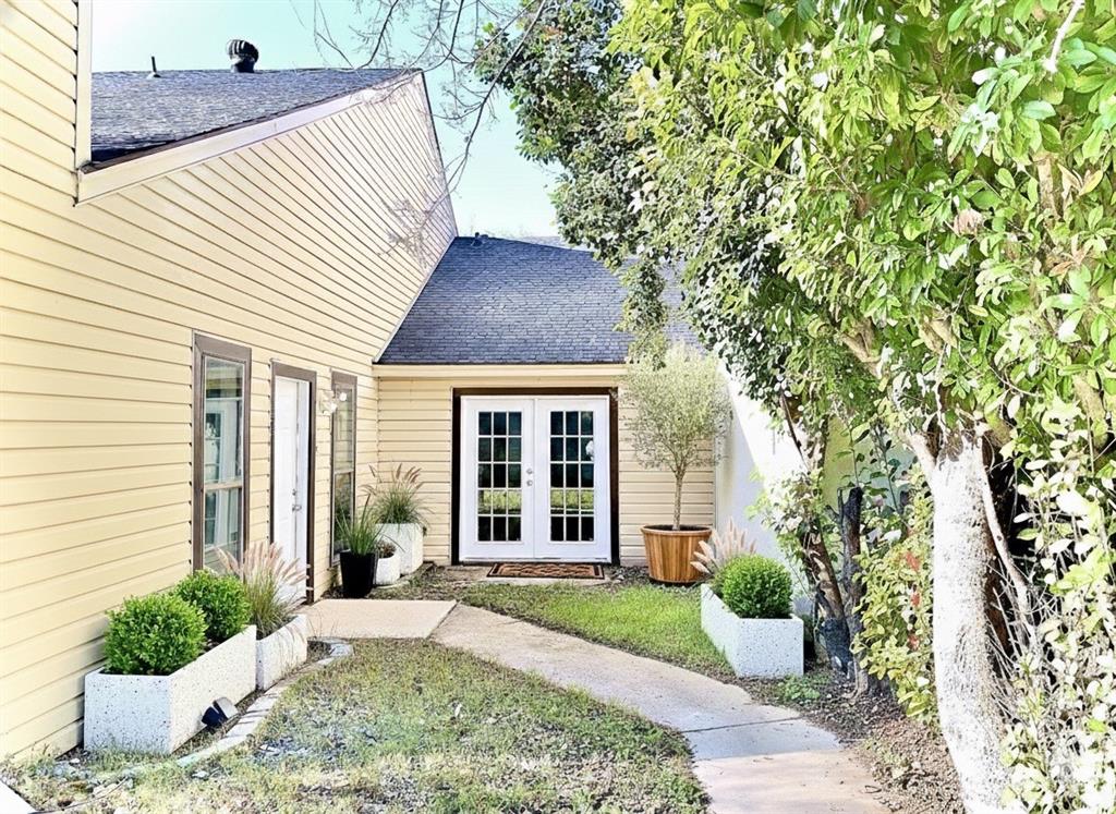1508 Grantbrook Lane Dallas, TX 75228 - Photo 11 of 11 a view of a house with a backyard