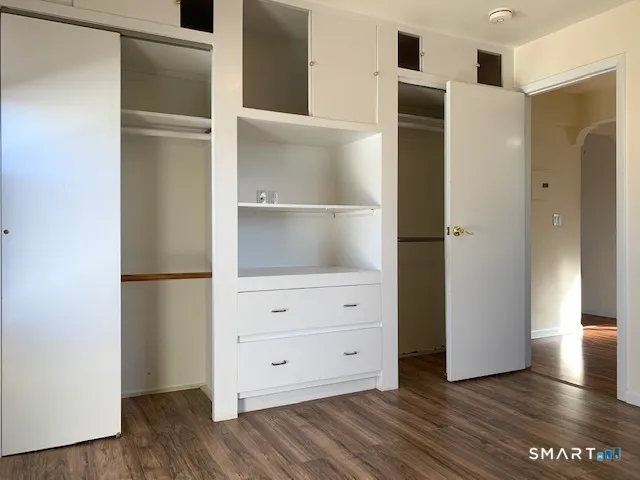a view of kitchen space with wooden floor