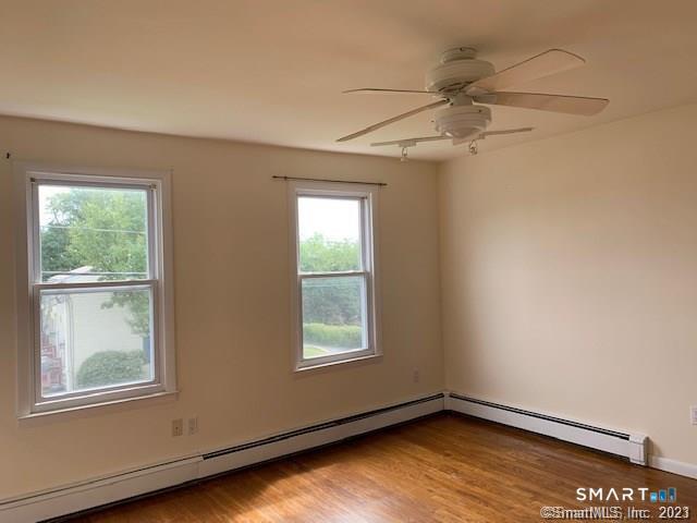 23 Fairview Avenue, Unit 2 Norwalk, CT 06850 - Photo 4 of 15 an empty room with windows