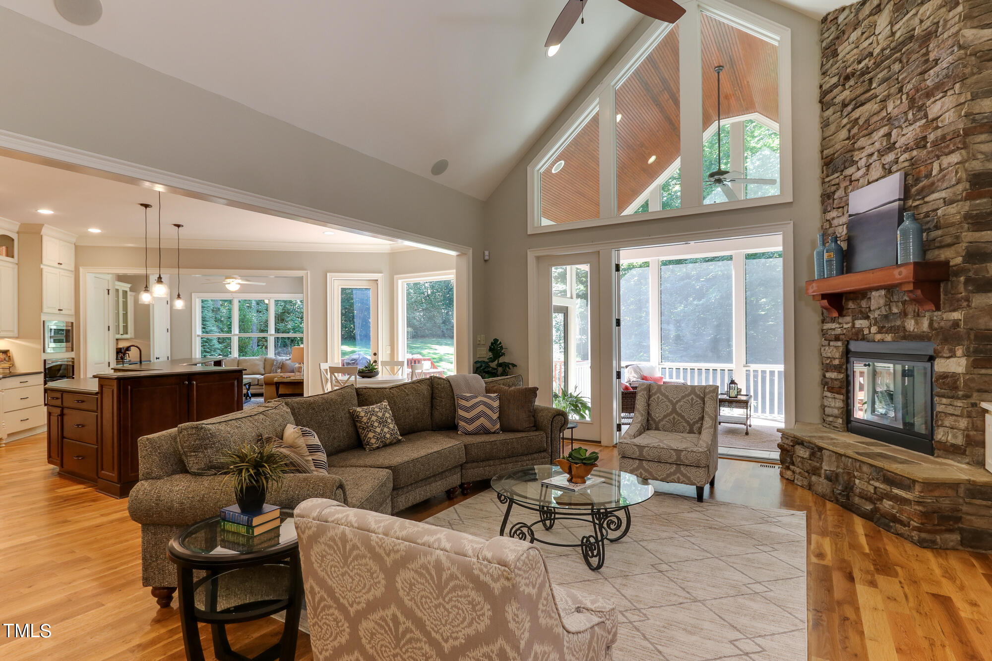 6909 Bartons Bend Way Raleigh, NC 27614 - Photo 9 of 80 Vaulted Family Room With Ceiling Fans And Floor To Ceiling Fireplace With Custom Mantle