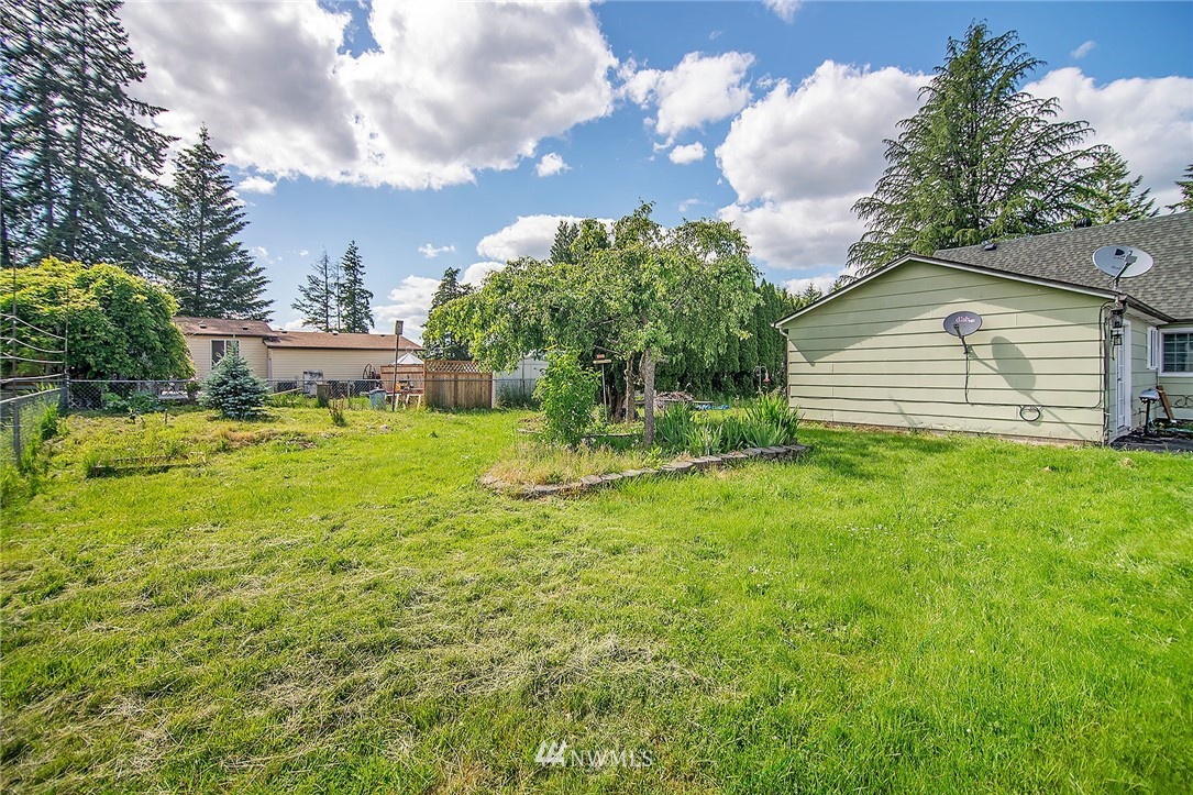 1009 Hilltop Road Winlock, WA 98596 - Photo 22 of 22 a view of a house with a yard
