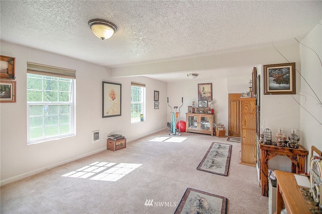 1009 Hilltop Road Winlock, WA 98596 - Photo 5 of 22 a view of livingroom with furniture and windows