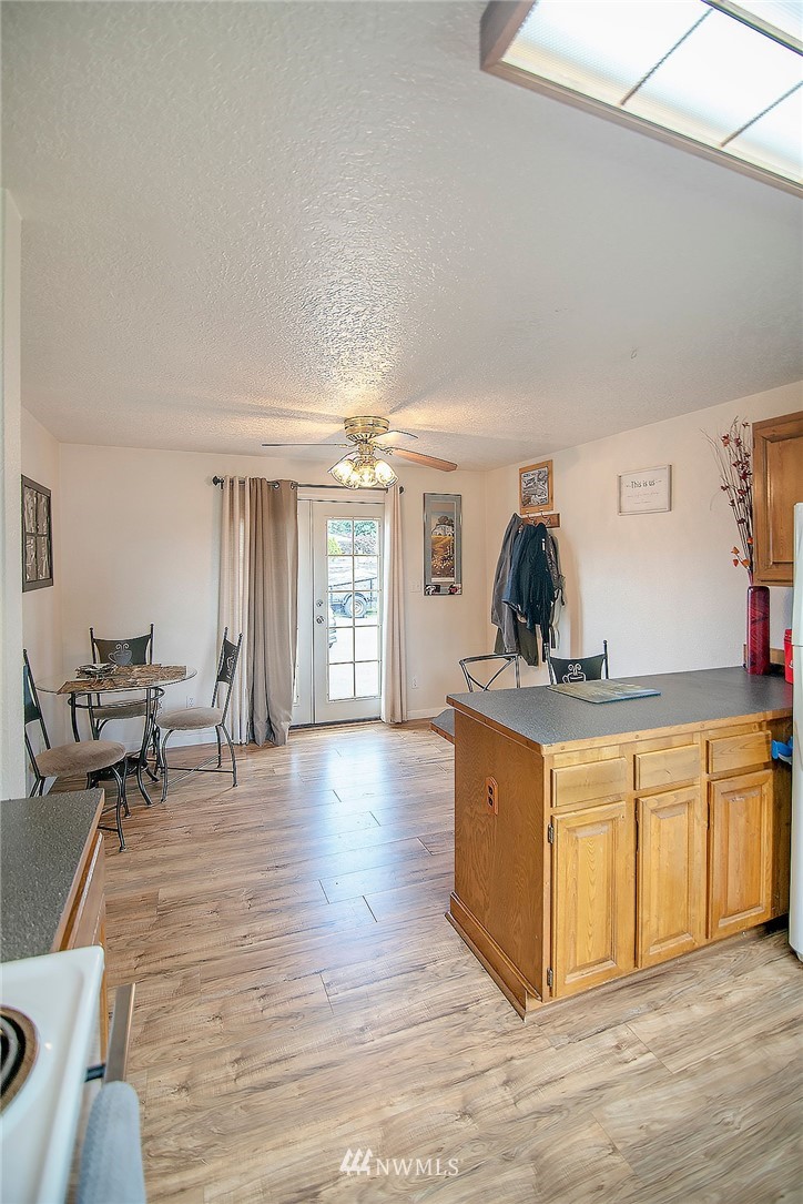 1009 Hilltop Road Winlock, WA 98596 - Photo 8 of 22 a living room with furniture and wooden floor