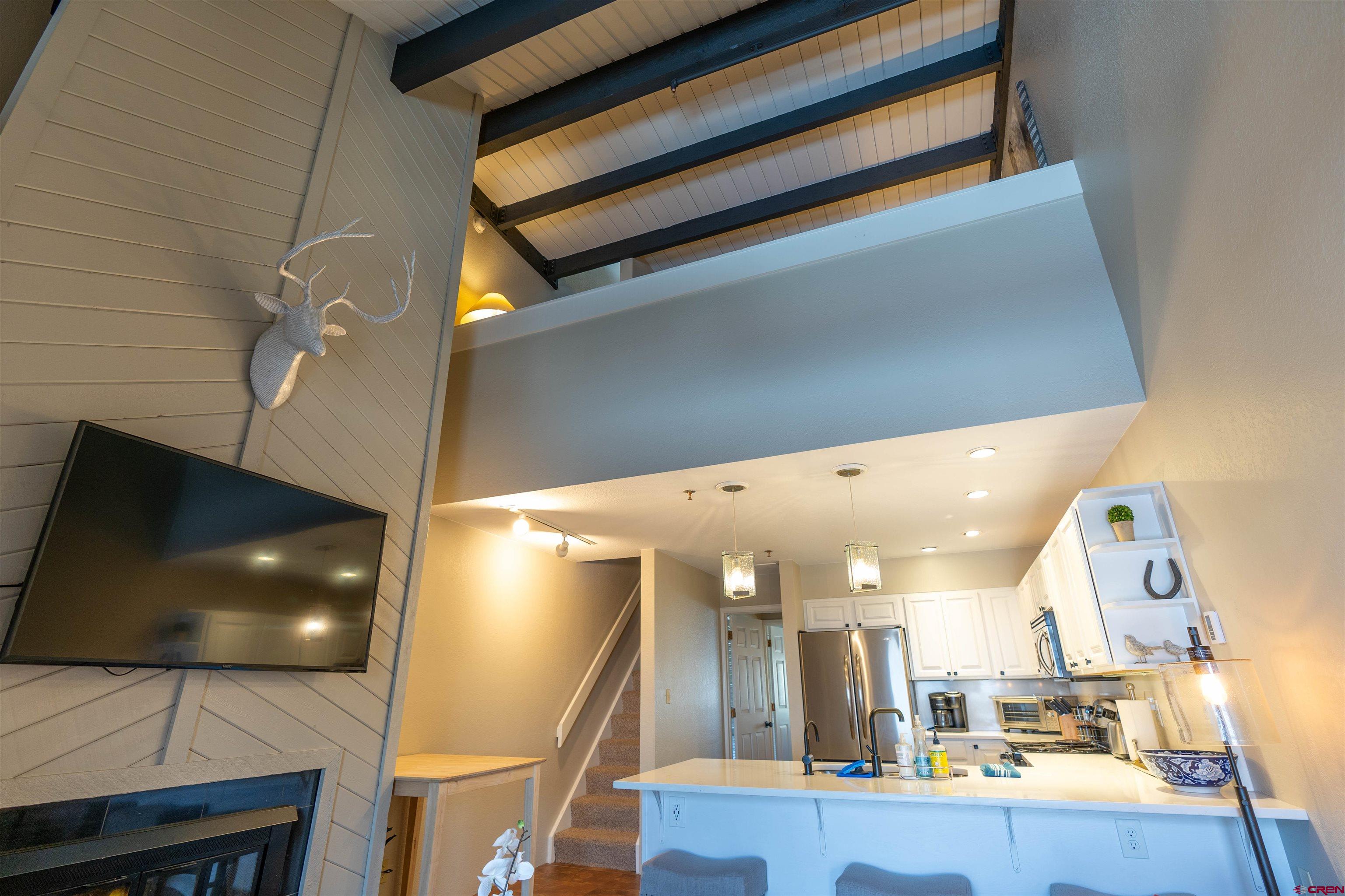 12 Snowmass Road, Unit 414 Crested Butte, CO 81225 - Photo 18 of 33 a view of a living room and bathroom