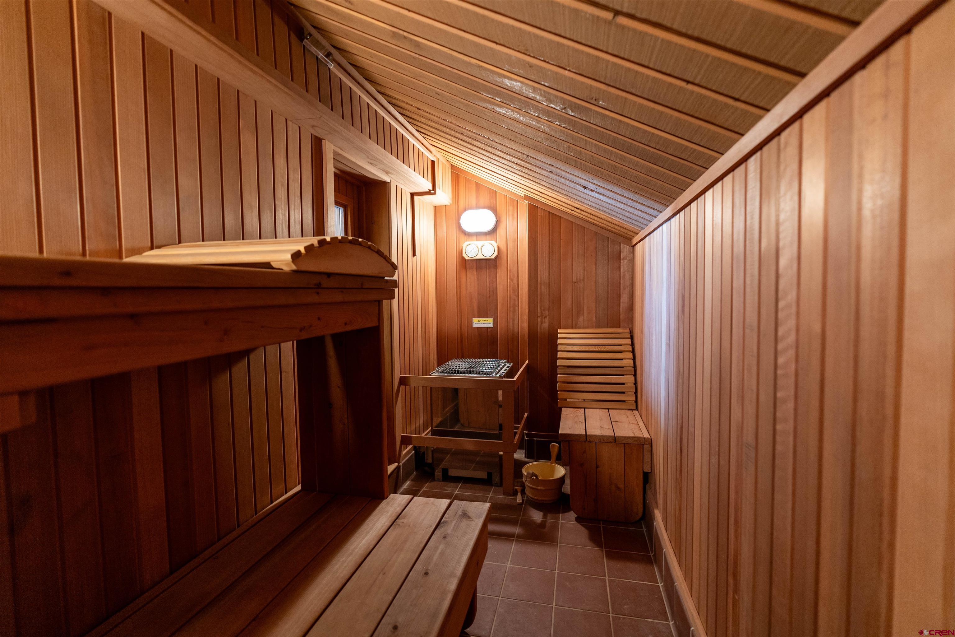 12 Snowmass Road, Unit 414 Crested Butte, CO 81225 - Photo 22 of 33 a view of a balcony with furniture and wooden floor