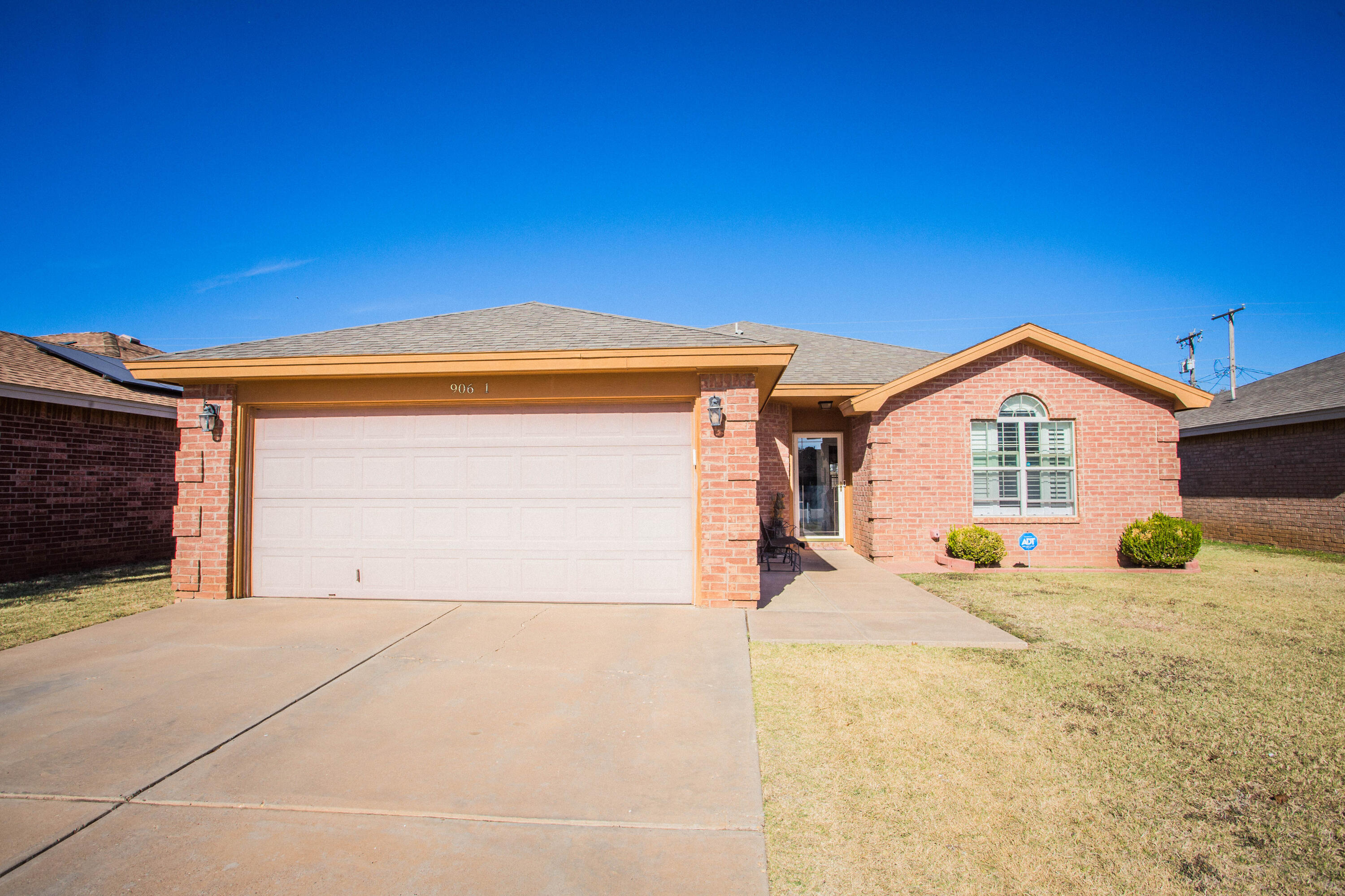 906 Xavier Street, Unit 1 Lubbock, TX 79403 - Photo 15 of 46 a view of a house with a outdoor space