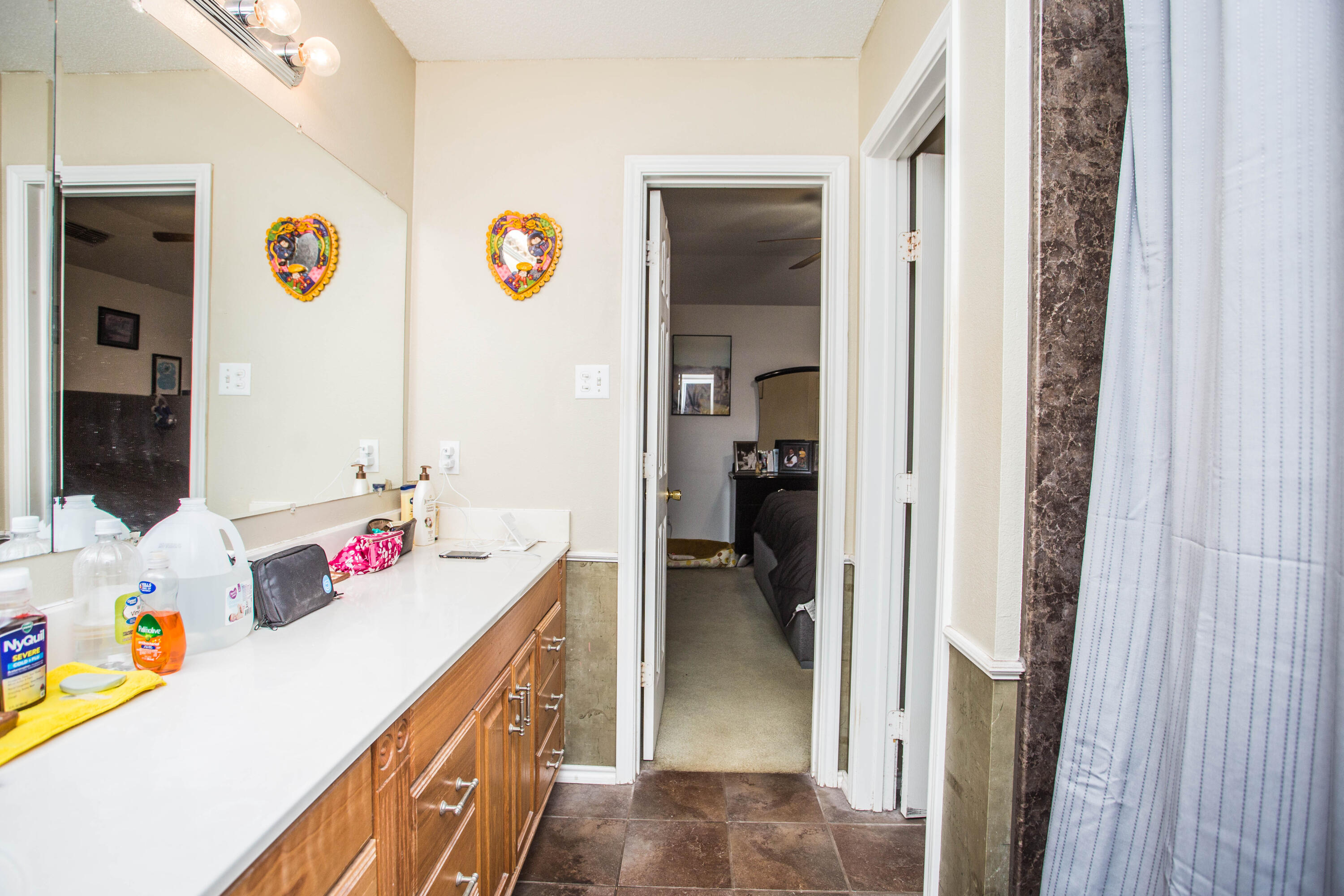 906 Xavier Street, Unit 1 Lubbock, TX 79403 - Photo 17 of 46 a kitchen with a refrigerator and a sink