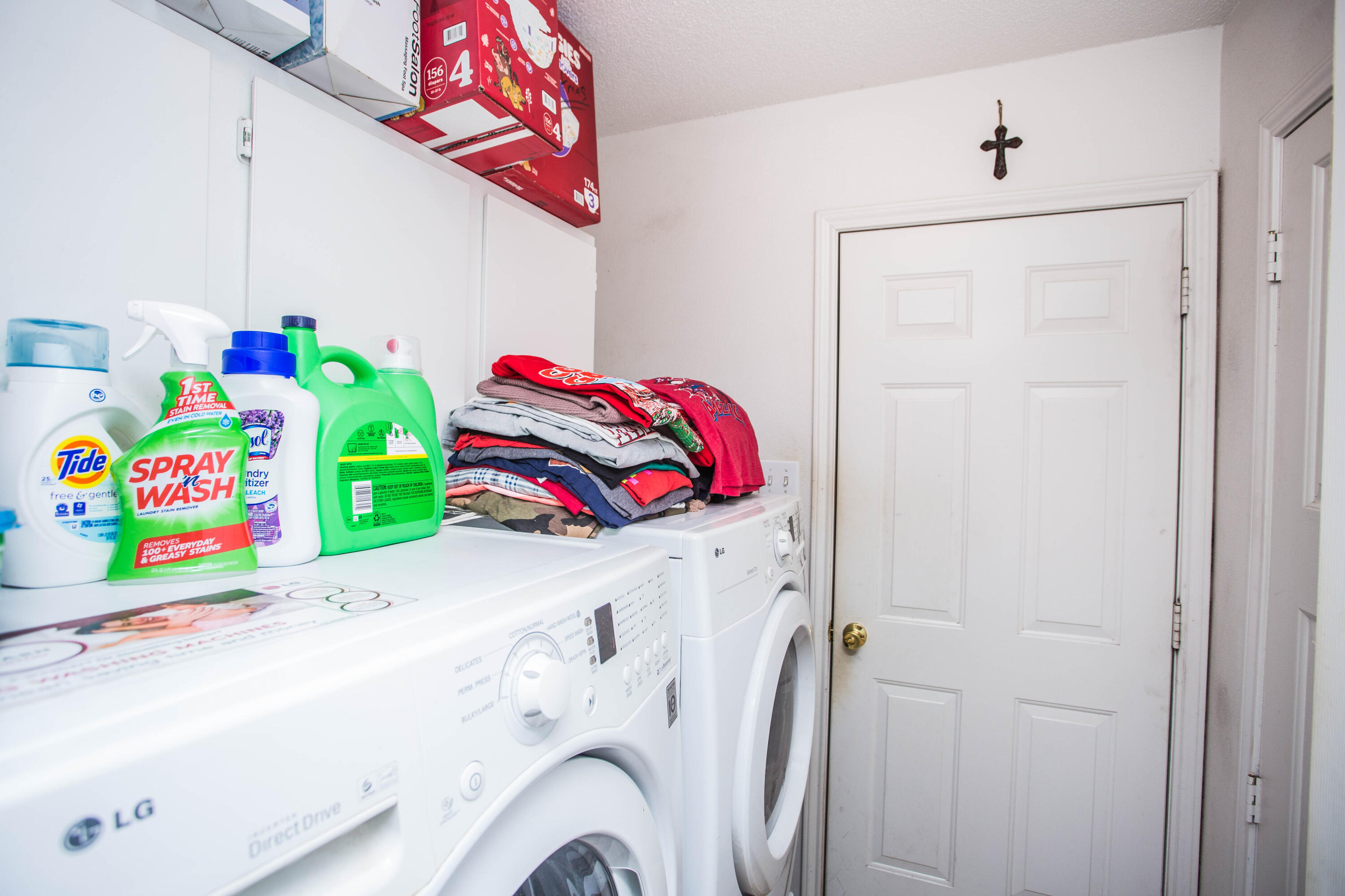 906 Xavier Street, Unit 1 Lubbock, TX 79403 - Photo 25 of 46 a utility room with dryer and washer