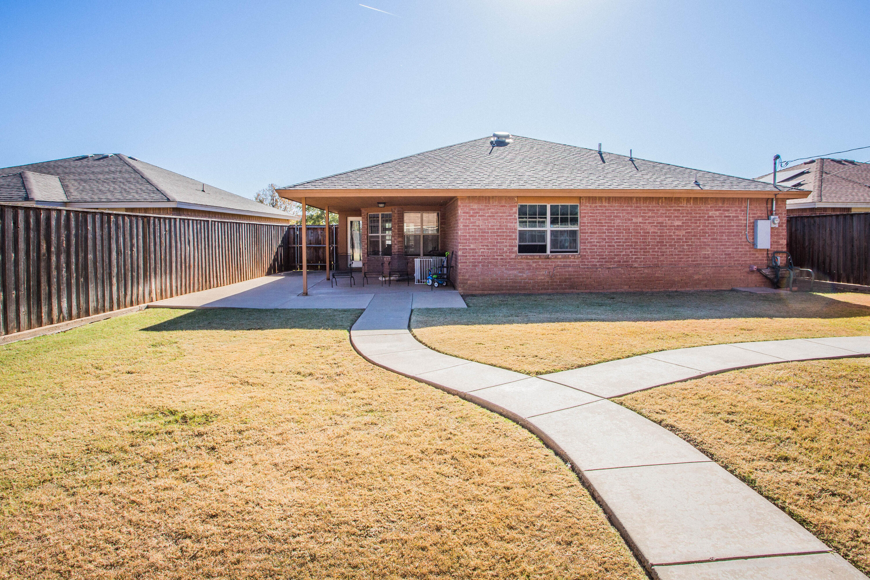 906 Xavier Street, Unit 1 Lubbock, TX 79403 - Photo 42 of 46 a front view of house with yard