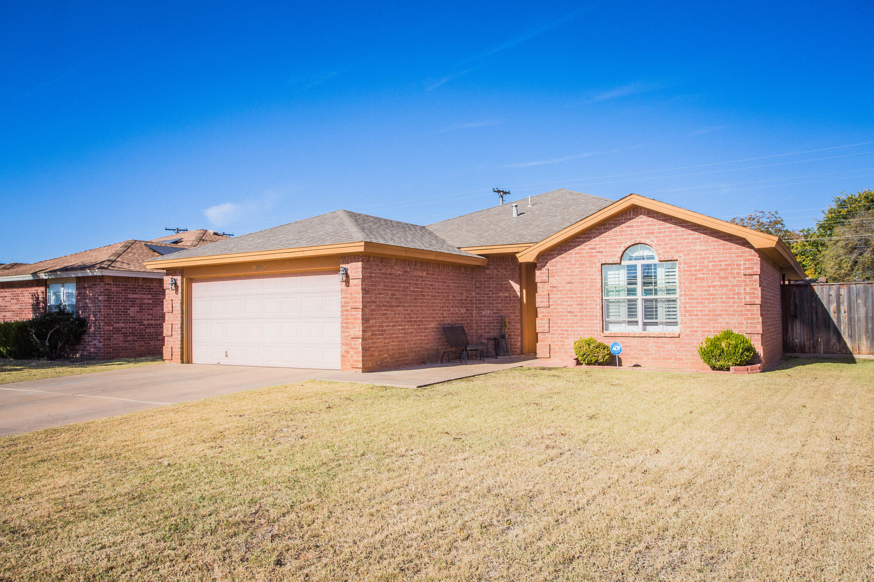906 Xavier Street, Unit 1 Lubbock, TX 79403 - Photo 46 of 46 a view of a house with a yard