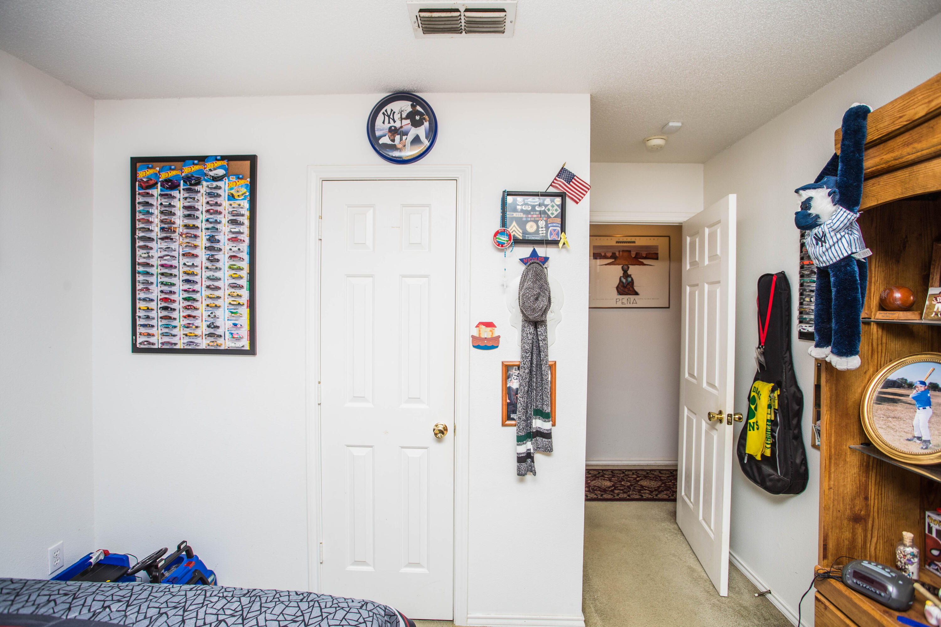 906 Xavier Street, Unit 1 Lubbock, TX 79403 - Photo 10 of 46 a view of a hallway with washer and dryer
