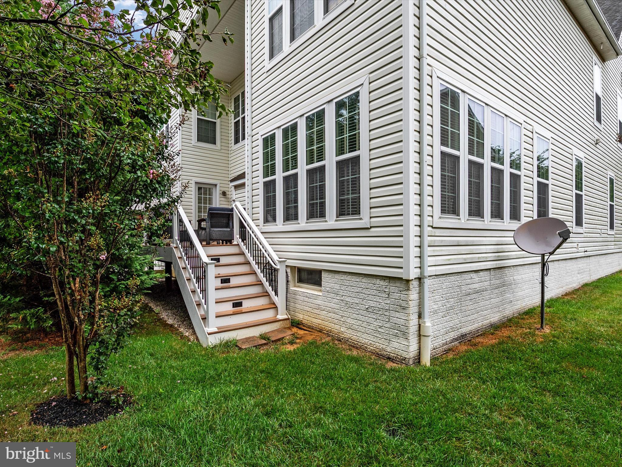 1914 Eamons Way Annapolis, MD 21401 - Photo 48 of 58 Side yard with walk out steps from deck
