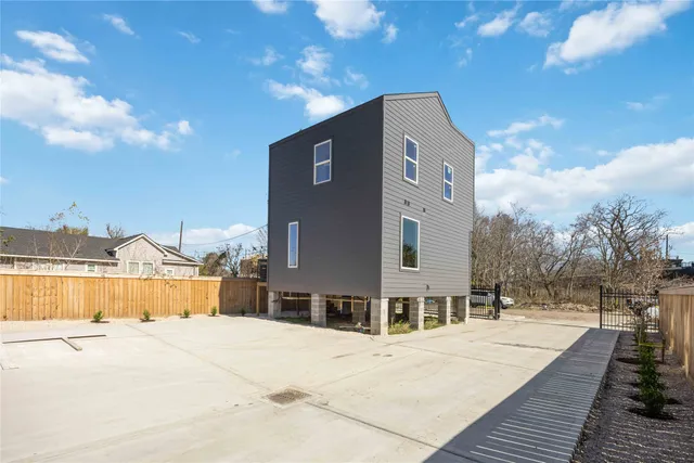a large building with a large tree in front of it