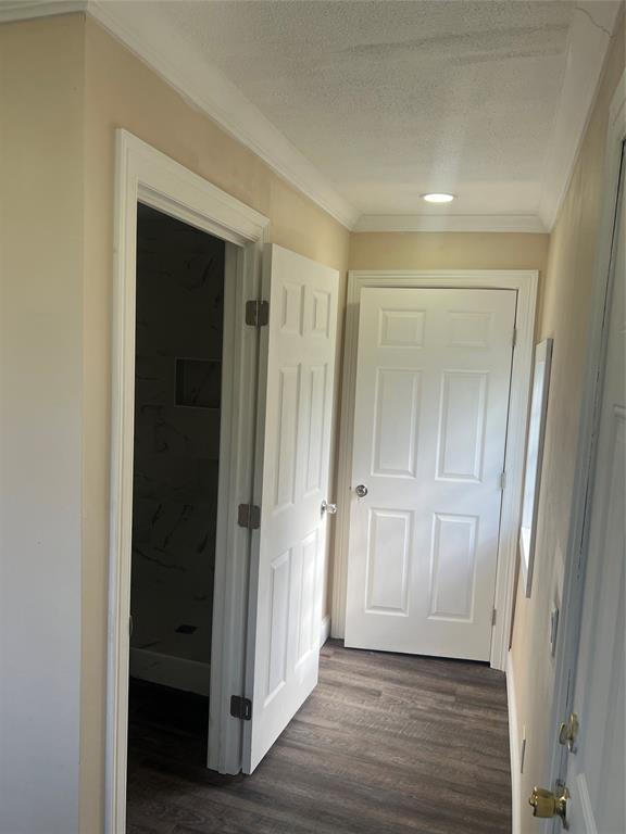 228 Bodcau Station Road Haughton, LA 71037 - Photo 12 of 16 a view of a hallway with wooden floor