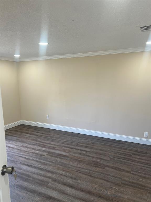 228 Bodcau Station Road Haughton, LA 71037 - Photo 5 of 16 a view of an empty room with wooden floor and a window