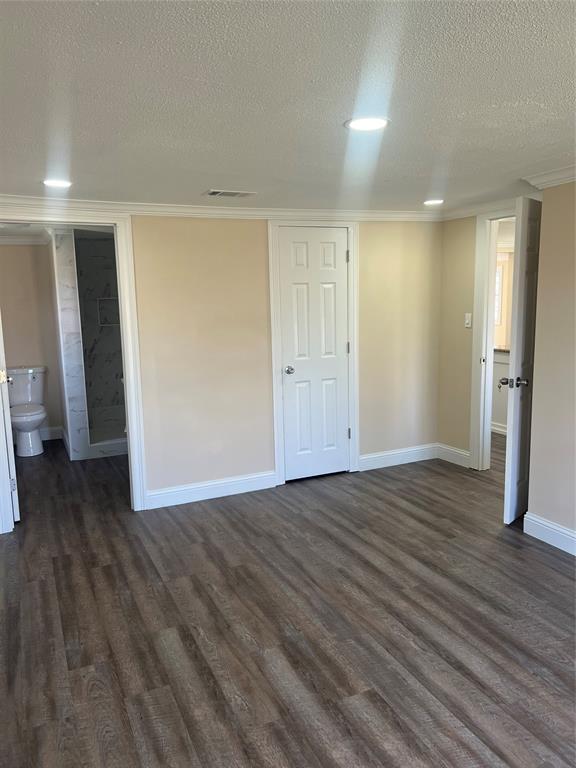 228 Bodcau Station Road Haughton, LA 71037 - Photo 6 of 16 a view of an empty room with wooden floor and closet
