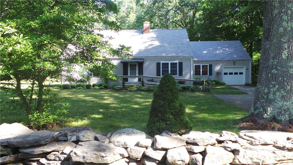 302 South Eagleville Road Mansfield, CT 06268 - Photo 1 of 1 a front view of a house with a garden