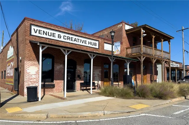 a view of a building with entrance gate