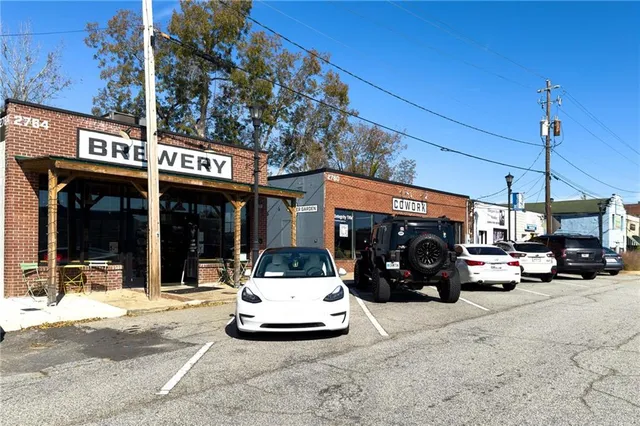 a view of a street with cars