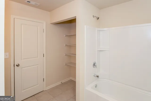 a bathroom with a bathtub