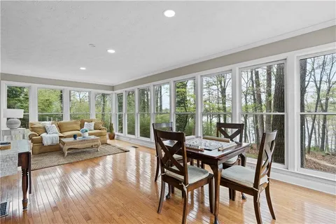 a kitchen with stainless steel appliances granite countertop a refrigerator a sink and dishwasher