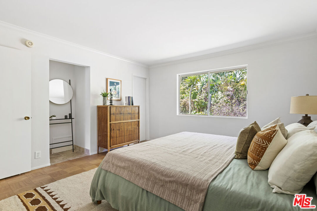 2015 Panamint Drive Los Angeles, CA 90065 - Photo 14 of 29 a bedroom with a bed and a dresser