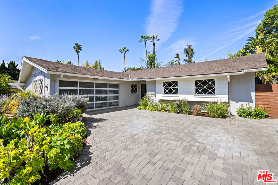 2015 Panamint Drive Los Angeles, CA 90065 - Photo 2 of 29 a front view of a house with a yard and potted plants