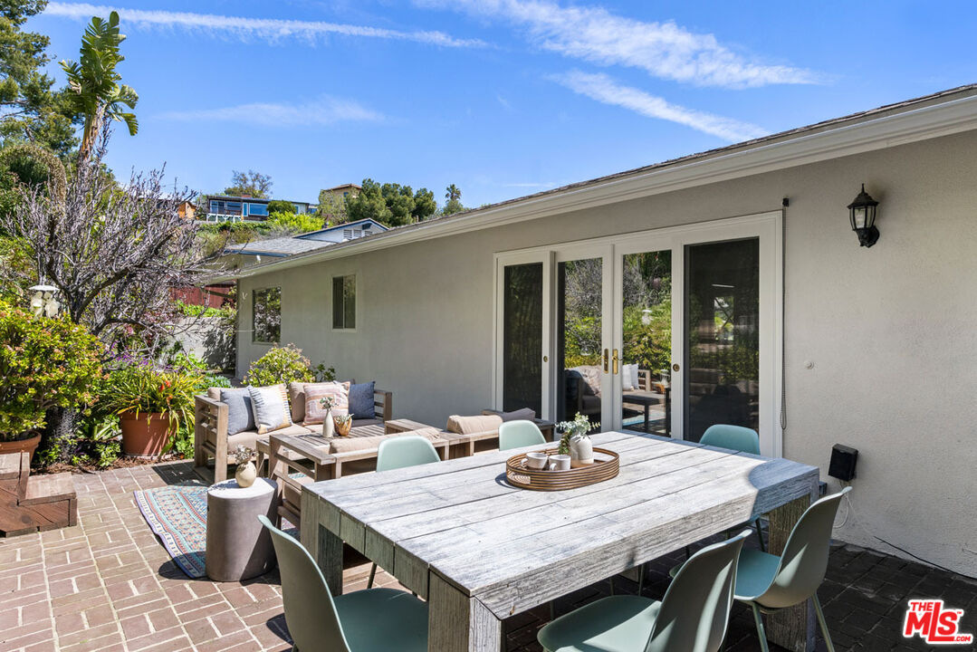 2015 Panamint Drive Los Angeles, CA 90065 - Photo 22 of 29 a view of a dinning table and chairs in patio