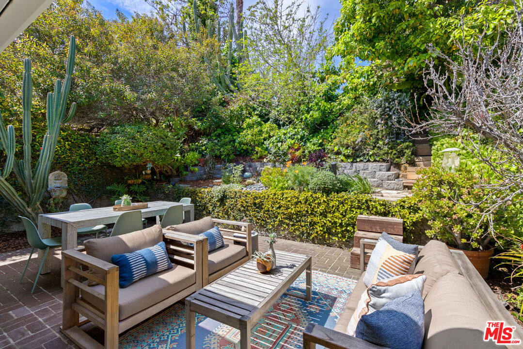 2015 Panamint Drive Los Angeles, CA 90065 - Photo 24 of 29 a view of a patio with couches and a fire pit and large trees