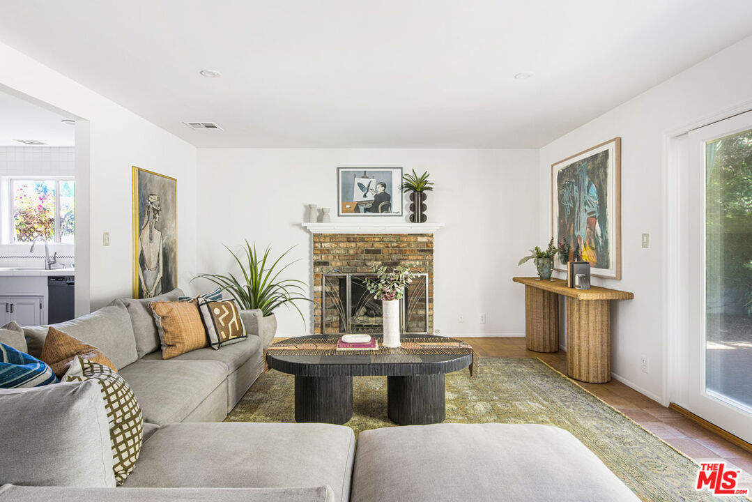 2015 Panamint Drive Los Angeles, CA 90065 - Photo 5 of 29 a living room with furniture and a fireplace