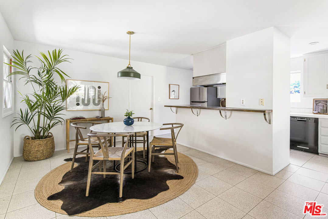 2015 Panamint Drive Los Angeles, CA 90065 - Photo 9 of 29 a dining room filled chandelier and wooden floor