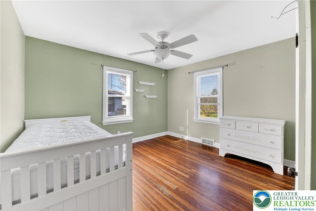 5370 Hanoverville Road Bethlehem, PA 18017 - Photo 12 of 24 a bedroom with a bed and a window